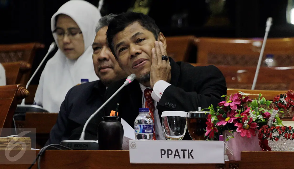  Kepala Pusat Pelaporan dan Analisis Transaksi Keuangan (PPATK) Muhammad Yusuf mengikuti Rapat Dengar Pendapat (RDP) dengan Komisi III DPR Di Kompleks Parlemen, Senayan, Jakarta, Kamis (11/2). (Liputan6.com/Johan Tallo)