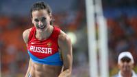 Peraih emas lompat galah putri Olimpiade 2004 dan 2008 dan pemegang rekor dunia, Yelena Isinbayeva, menjadi salah satu atlet Rusia yang terancam gagal tampil di Olimpiade Rio 2016 karena diduga doping. (AFP/Franck Fife)