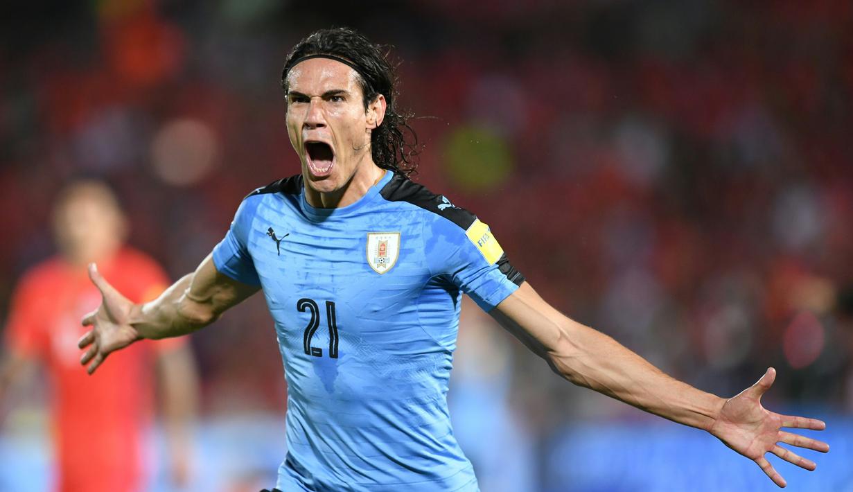  Ekspresi striker Uruguay, Edinson Cavani, setelah mencetak gol ke gawang Cile pada laga Kualifikasi Piala Dunia 2018 zona CONMEBOL di Stadion Nasional Julio Martinez Pradanos, Santiago, Rabu (16/11/2016) pagi WIB. (AFP/Martin Bernetti)