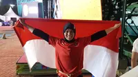Atlet panjat tebing Indonesia, Aries Susanti Rahayu, meraih medali emas pada nomor speed atau kecepatan Asian Games 2018, Kamis (23/8/2018). (Bola/Riskha Prasetya)