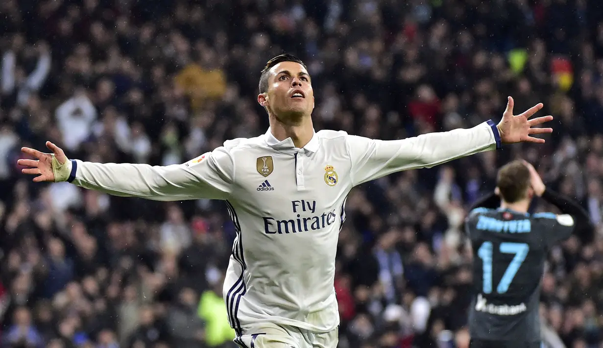 Cristiano Ronaldo merupakan pencetak gol terbanyak sepanjang massa Real Madrid. Ia berhasil persembahkan 450 gol dan 132 assist dari 437 penampilan di semua kompetisi. Torehannya terhenti sejak 2018 lalu ketika dirinya memutuskan hengkang ke Juventus. (Foto: AFP/Gerrard Julien)