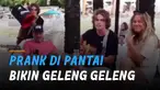 Seorang pemuda membuat prank di pantai dan teknik menipunya bikin geleng-geleng kepala.