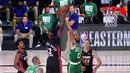 Pebasket Boston Celtics, Jayson Tatum, berebut bola dengan pebasket Miami Heat, Bam Adebayo, pada gim keempat final NBA Wilayah Timur di AdventHealth Arena, Kamis (24/9/2020). Miami Heat menang dengan skor 109-112. (AP/Mark J. Terrill)