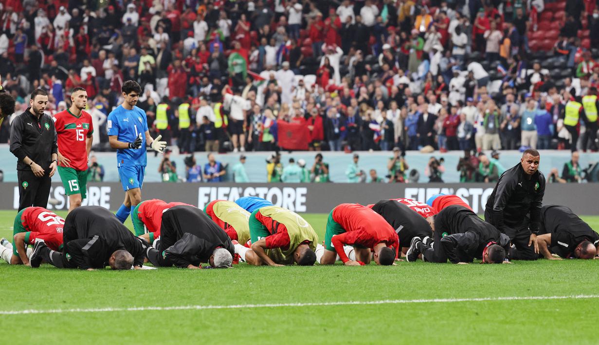 Meski begitu, Singa Atlas berhasil mencatatkan sejarah sekaligus memenangkan hati jutaan orang. Terutama bagi orang Arab, Afrika dan Muslim di dunia. (AFP/Karim Jaafar)