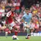 Gelandang asal Brasil Arsenal nomor punggung 39, Bruno Guimaraes, berlari membawa bola dalam pertandingan sepak bola FA Community Shield Inggris antara Arsenal dan Manchester City di Principality Stadium, Cardiff, Wales Selatan, pada 16 Agustus 2026. (Adrian DENNIS / AFP)