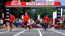 Minggu (18/05/14) ratusan anjing beserta pemiliknya mengikuti lomba lari di Parkir Timur, Senayan (Liputan6.com/Andrian M Tunay)