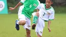 Anak-anak terpilih bertanding pada MILO Football Championship 2019 di Ciputat, Tangerang Selatan, Sabtu (27/4/2019). Sebanyak 16 pemain terbaik dibagi menjadi dua tim yaitu Tim Kurniawan dan Tim Ponaryo yang akan dinilai mewakili Indonesia di MILO Champions Cup di Barcelona. (Liputan6.com/HO/Rizky)