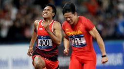 Pelari Indonesia, Lalu Muhammad Zohri, saat berlaga pada nomor 100 meter Asian Games di SUGBK, Jakarta, Minggu (26/8/2018). Lalu Zohri finish diurutan ke tujuh dengan catatan waktu 10,20 detik. (Bola.com/Peksi Cahyo)