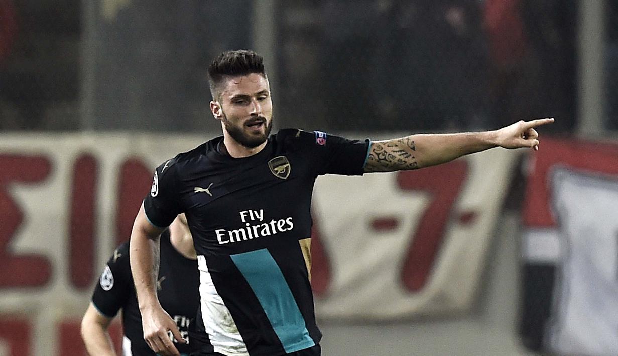 Pemain Arsenal, Olivier Giroud mencetak 5 gol  (AFP Photo/Angelos Tzortzinis)