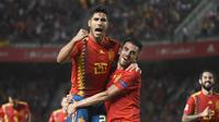 Gelandang Timnas Spanyol, Marco Asensio (kiri), meluapkan kegembiraan usai mencetak gol ke gawang Kroasia, pada laga UEFA Nations League Liga A Grup 4, Selasa (11/9/2018) waktu setempat, di Stadion Manuel Martinez Valero, kota Elche.  (AFP / Jose Jordan)