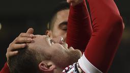 Ekspresi Wayne Rooney setelah mencetak gol ketiga MU ke gawang Stoke City dalam lanjutan Liga Inggris di Stadion Old Trafford, Manchester, Rabu (3/2/2016) dini hari WIB. (AFP/Paul Ellis)