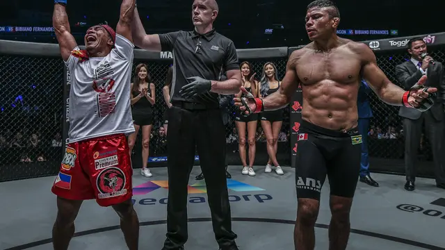 Kevin Belingon mengalahkan Bibiano Fernandes dalam duel penyatuan gelar kelas bantam ONE Championship di Singapura, Jumat 9 November 2018