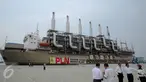 Penampakan bagian luar Marine Vessel Power Plant saat bersandar di Pelabuhan IPC, Jakarta, Selasa (8/12). Marine Vessel Power Plant dibuat oleh perusahaan asal Turki, Karpowership, pada 2014. (Liputan6.com/Faizal fanani)