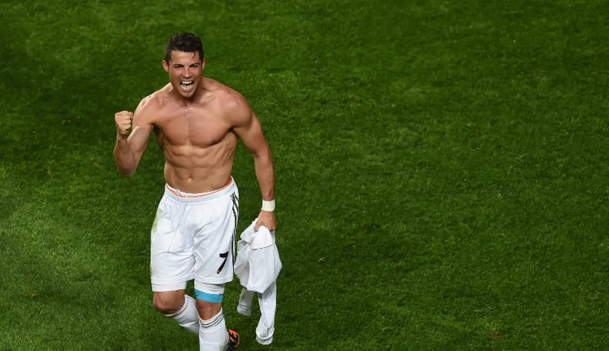  Eksekusi penalti Cristiano Ronaldo di menit 119 menutup pesta Madrid di Estadio da Luz, Lisbon, Portugal, Minggu (25/5/2014) CR7 luapkan kegembiraannya. (AFP PHOTO/FRANCISCO LEONG) 
