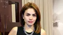 Aktris Nikita Mirzani berpose usai ditemui di SCTV Tower, Senayan, Kamis (17/12). Mengenakan baju hitam, Nikita berbicara tegas dan sangat meyakinkan kalau dirinya bukan pelacur seperti yang dituduhkan banyak orang. (Liputan6.com/Yudha Gunawan)