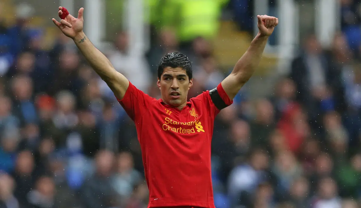 Pada pertengahan musim 2010/2011 Luis Suarez hijrah ke Liga Inggris untuk bergabung dengan Liverpool. Bertahan selama 3,5 musim hingga akhir musim 2013/2014 ia sukses mencetak 82 gol bareng The Reds di semua kompetisi dari total 133 laga. (AFP/Andre Cowie)