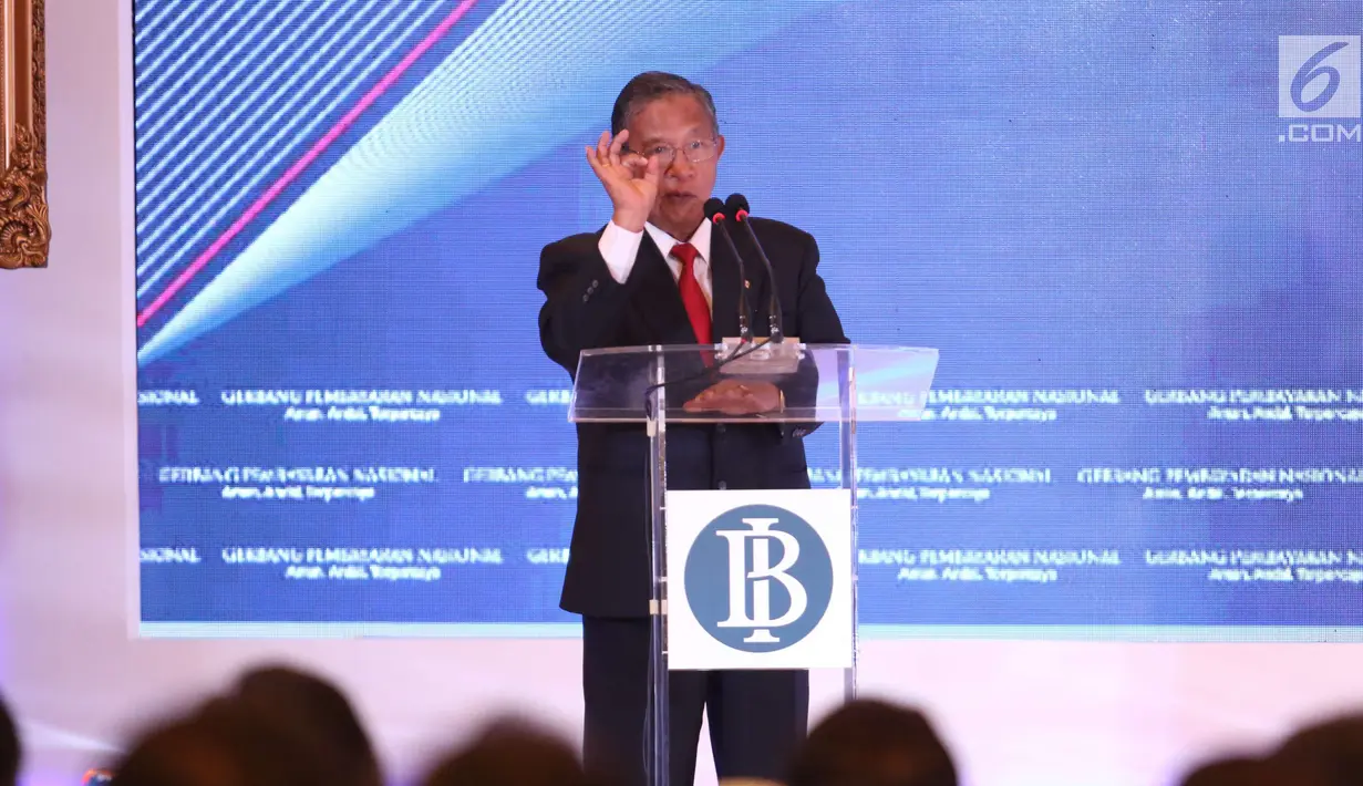 Menko Perekonomian Darmin Nasution memberi sambutan dalam acara launching Gerbang Pembayaran Nasional (GPN) di Gedung BI, Jakarta, Senin (4/12). BI meresmikan GPN sebagai sistem pembayaran yang terintegrasi di Indonesia. (Liputan6.com/Angga Yuniar)