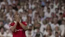 Penyerang Manchester United (MU) Anthony Martial bereaksi saat melawan Sevilla pada leg kedua babak perempat final final Liga Europa 2022/2023 di Estadio Ramon Sanchez-Pizjuan, Jumat (2/4/2023). (Photo by JORGE GUERRERO / AFP)
