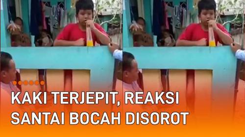 VIDEO: Kaki Terjepit di Pagar Beton, Reaksi Santai Bocah Disorot