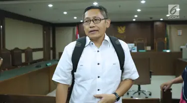 Terpidana kasus korupsi Pembangunan P3SON Hambalang, Anas Urbaningrum usai menjalani sidang lanjutan PK di Pengadilan Negeri Jakarta Pusat, Kamis (12/7). Sidang beragenda pembacaan kesimpulan pemohon Peninjauan Kembali. (Liputan6.com/Helmi Fithriansyah)