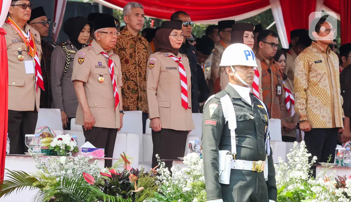 Wakil Presiden Ma`ruf Amin bertindak sebagai Pembina Upacara Hari Pramuka ke-63 tahun 2024 yang dipusatkan di Lapangan Utama Bumi Perkemahan dan Graha Wisata Pramuka (Buperta), Jakarta. (Liputan6.com/Herman Zakharia)