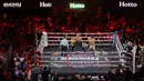 Pertarungan tiga ronde ini dimulai dengan intensitas tinggi sejak awal. Ronde pertama menampilkan aksi saling serang antara kedua fighter di ring tinju. (Bola.com/Abdul Aziz)