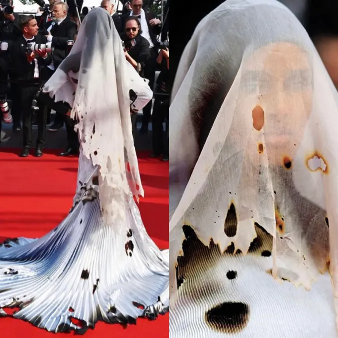 Penampilan model Somalia yang mengenakan gaun "terbakar"