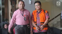 Hakim Pengadilan Negeri Semarang, Lasito dengan rompi tahanan meninggalkan gedung KPK, Jakarta, Selasa (26/3). Lasito ditahan oleh KPK setelah menjalani pemeriksaan sebagai tersangka kasus suap terkait putusan atas praperadilan kasus korupsi yang ditangani PN Semarang. (merdeka.com/Dwi Narwoko)