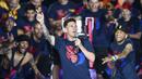 Lionel Messi dan para pemain Barcelona merayakan gelar liga Champions setelah mengalahkan Juventus 3-1 di Stadion Camp Nou, Barcelona, (7/6/2015).  (AFP Photo/Josep Lago)