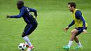 Kepiawaian N’Golo Kante itu berhasil membawanya ke timnas Prancis di bawah asuhan Didier Deschamps. Bersama Les Blues, Kante sudah menorehkan delapan kali penampilan termasuk saat Piala Eropa 2016. (AFP/Franck Fife)