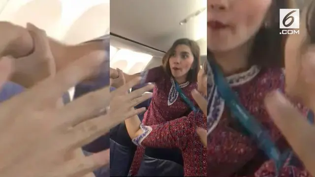 Seorang penumpang adu mulut dengan pramugadi di dalam pesawat.