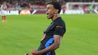 Menit ke-28, Blaugrana menyamakan skor setelah Lamine Yamal berhasil melesakkan bola ke gawang AS Monaco. (AP Photo/Laurent Cipriani)