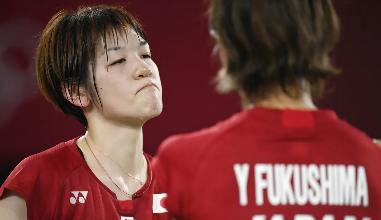 Wakil Indonesia ini sukses mengalahkan unggulan pertama asal Jepang, Yuki Fukushima/Sayaka Hirota di Musasino Forest Sport Plaza, Selasa (27/7/2021). (Foto:AFP/Alexander Nemenov)