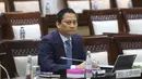 Keputusan ini diambil dalam rapat internal Komisi XI DPR RI setelah dilakukan uji kelayakan dan kepatutan (fit and proper test). Tampak dalam foto, Wakil Menteri Keuangan yang juga Calon Deputi Gubernur Bank Indonesia, Thomas Djiwandono bersiap mengikuti uji kelayakan dan kepatutan di ruang Komisi XI Dewan Perwakilan Rakyat Republik Indonesia di Kompleks Parlemen, Senayan, Jakarta, Senin (26/1/2026). (Merdeka.com/Arie Basuki)
