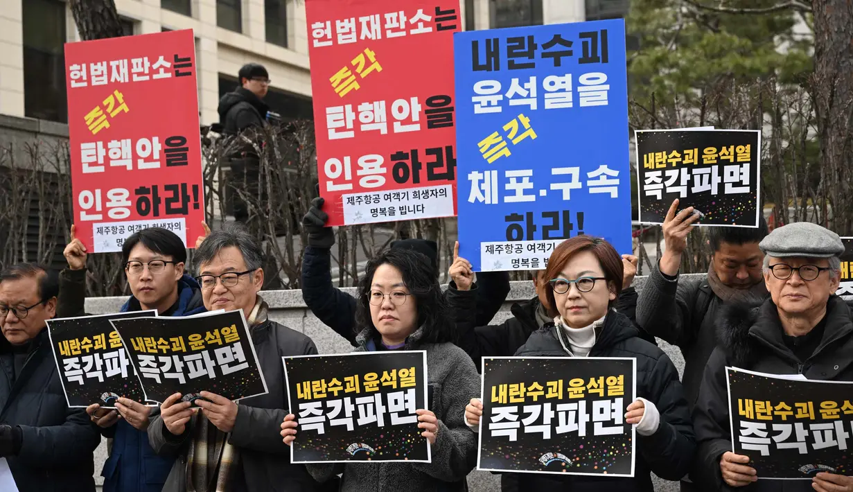 Penundaan dikarenakan pemimpin yang dimakzukan tersebut tidak hadir dalam persidangan. (Jung Yeon-je/AFP)