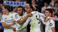Momen selebrasi Jude Bellingham (Real Madrid) bersama rekan setim setelah mencetak gol pertama timnya dalam laga Liga Champions di Madrid, Spanyol, 23 Oktober 2025. (AP Photo/Manu Fernandez)