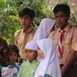 Anna Sophana mengenakan batik saat menghadiri acara Pemberantasan Sarang Nyamuk dengan mengenakan pakaian batik (Dok. Instagram/@annasophanah/https://www.instagram.com/p/BQ4XqnrA1Sm/Komarudin)