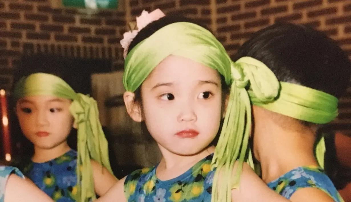 Wajah cantik IU sudah terlihat sejak ia kecil. (Liputan6.com/IG/@dlwlrma)