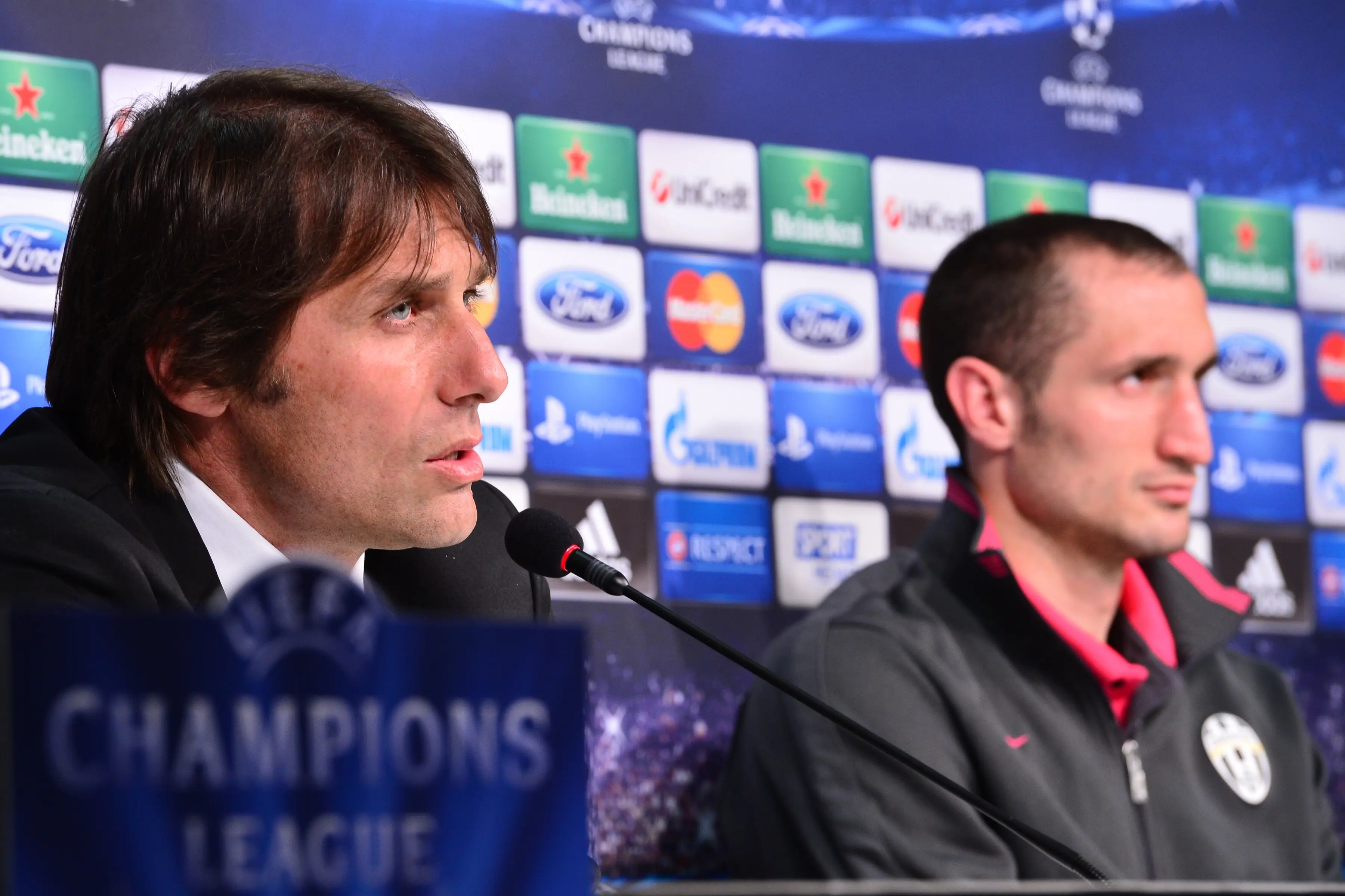 Antonio Conte dan Giorgio Chiellini saat masih bekerja sama di Juventus. (GIUSEPPE CACACE / AFP)