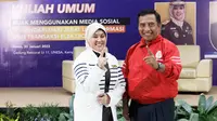 Kajati Jatim Mia Amiati bersama rektor Unesa Nurhasan. (Dian Kurniawan/Liputan6.com)