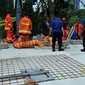 Sebelum terjadi peristiwa kebakaran ini, api tersebut mengeluarkan ledakan keras  dari gorong-gorong Jenderal Sudirman, Jakarta,Kamis, (17/7/14) (Liputan6.com / Johan Tallo)