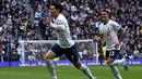 Selebrasi striker Tottenham Hotspur, Son Heung-min setelah menjebol gawang Brighton and Hove Albion pada laga Liga Inggris 2022/2023 di Tottenham Hotspur Stadium, London, 8 April 2023. Son Heung-min menjadi pemain Asia pertama yang mampu mencetak 100 gol di Liga Inggris. Momen itu tercipta saat ia mencetak gol pembuka Tottenham Hotspur yang akhirnya menang 2-1 atas Brighton and Hove Albion pada laga pekan ke-30 Liga Inggris 2022/2023 (8/4/2023). (AFP/Ben Stansall)