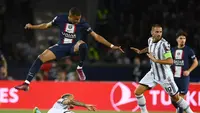 Aksi pemain Paris Saint-Germain, Kylian Mbappe, saat melawan Juventus pada matchday pertama Liga Champions di Parc des Princes, Rabu (6/9/2022) dini hari WIB. 
(Franck Fife/AFP)