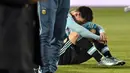Ekspresi kesedihan Lionel Messi setelah kalah adu penalti melawan Cile. (AFP PHOTO/NELSON ALMEIDA)