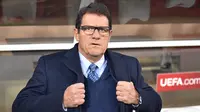 Fabio Capello dikenal sebagai pelatih yang melarang bumbu bagi pemainnya. Ia juga menghapus cokelat, saus tomat, dan mentega dari daftar menu makanannya saat melatih Timnas Inggris. Hasilnya cukup impresif. The Three Lions berhasil meriah 28 kemenangan dari 42 pertandingan. (AFP/Kirill Kudryavtsev)