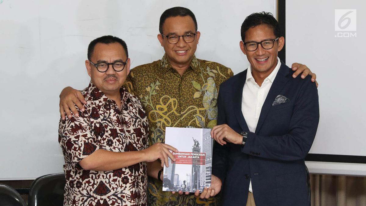 PHOTO: Anies-Sandi Terima Laporan Hasil Kerja Tim Sinkronisasi