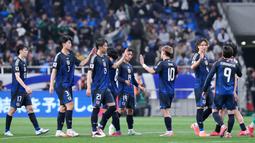Jepang mantap di puncak klasemen Kualifikasi Piala Dunia 2026 Grup C zona Asia. Tim Samurai Biru mengoleksi 20 poin dari delapan pertandingan. (AP Photo/Eugene Hoshiko)