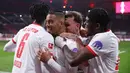 Sementara gol penutup dilesatkan oleh Benjamin Henrichs pada menit ke-78. (AFP/Ronny Hartmann)