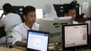 Pelajar mengikuti Ujian Nasional Berbasis Komputer (UNBK) di SMK Negeri 1, Jakarta, Senin (2/4). Sebanyak 1.485.302 siswa dari 13.054 sekolah menengah kejuruan (SMK) sederajat mengikuti Ujian Nasional (UN). (Liputan6.com/Arya Manggala)