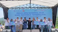 Untuk memudahkan transaksi masyarakat, Kantor Perwakilan (KPw) Bank Indonesia (BI) Tasikmalaya, Jawa Barat, terus mengkampanyekan penggunaan alat transaksi digital melalui Pekan QRIS Nasional (PQN) 2024. (Liputan6.com/Jayadi Supriadin)